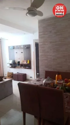 Imagem Apartamento com 2 dormitórios à venda, 64 m² por R$ 220.000,00 - Saboó - Santos/SP