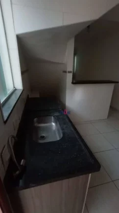 Imagem Casa tipo sobreposta baixa isolada, quintal com churrasqueira, 3 dormitórios à venda, 75 m² por R$ 480.000 - Marapé - Santos/SP