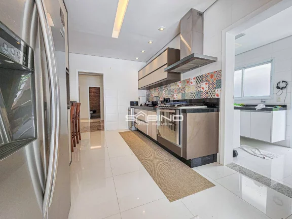 Imagem Belíssima casa à venda na Riviera de São Lourenço - Bertioga SP | 5 Dormitórios | 5 Suítes | 390 m² de área útil.