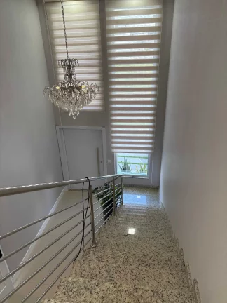 Imagem Casa mobiliada no Condomínio Caledônia com 4 suítes e 4 vagas de garagem em Camboriú