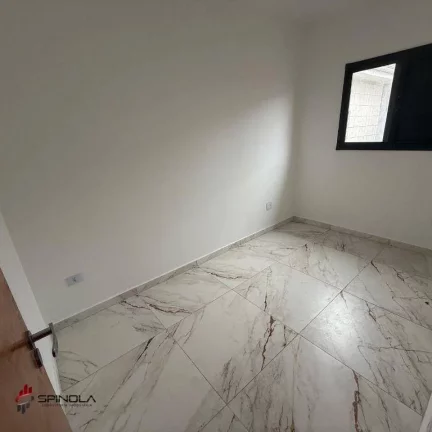 Imagem Sobrado com 2 dormitórios à venda, 54 m² por R$ 345.000 - Maracanã - Praia Grande/SP