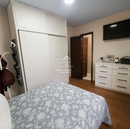 Imagem Casa à venda em Guarujá-SP na Vila Luis Antônio com 3 quartos, 1 suíte, 3 vagas de garagem e 160m² de área.