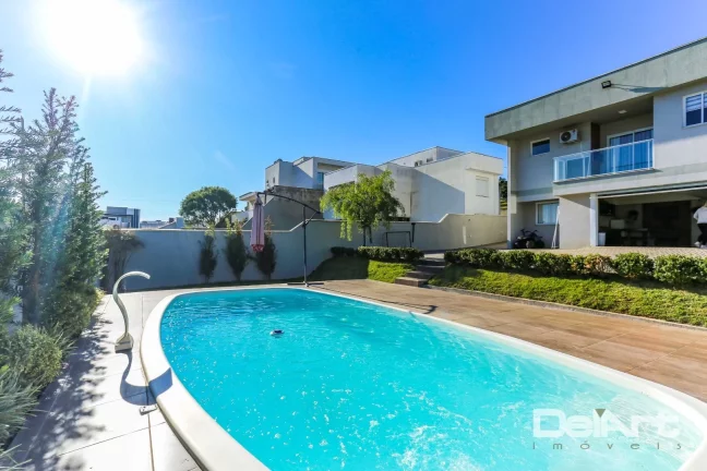 Imagem CASA RESIDÊNCIAL EM CONDOMÍNIO FECHADO (alto padrão) - Com PISCINA AQUECIDA em Mafra/SC - 237.00m2 de construção - 535,00m2 de Terreno.