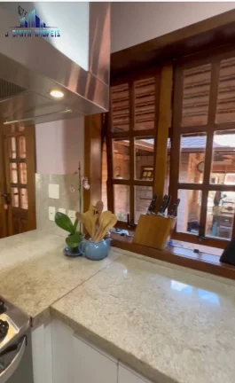 Imagem CASA TÉRREA ESTILO NORMANDO, 4 SUÍTES, TERRENO 1.107m², COND. NA GRANJA