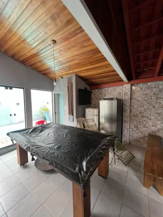 Imagem Sobrado com 4 dormitórios para alugar, 200 m² por R$ 4.180,00/mês - Travessão - Caraguatatuba/SP