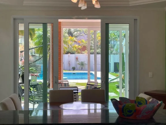 Imagem Casa à venda na Riviera de São Lourenço Módulo 03: 4 quartos, 4 suítes, 3 salas, 8 vagas de garagem e 329,74 m² de área.