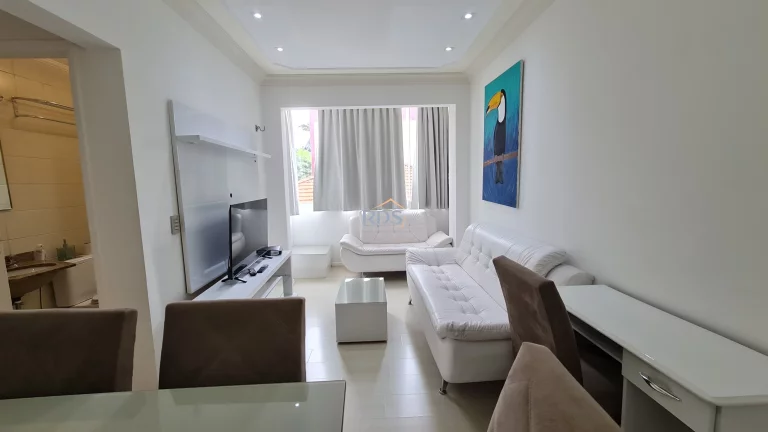 Imagem Vende um aconchegante apartamento de 51m², com dois dormitórios sendo uma suíte, uma vaga coberta