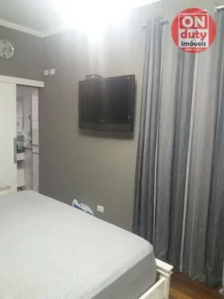 Imagem Sobrado com 5 dormitórios à venda, 290 m² por R$ 1.800.000,00 - Boqueirão - Santos/SP