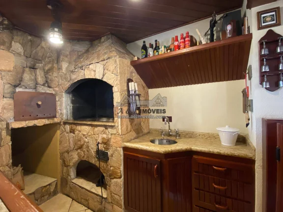 Imagem Casa à venda em Campos do Jordão – Linda casa com 7 suítes