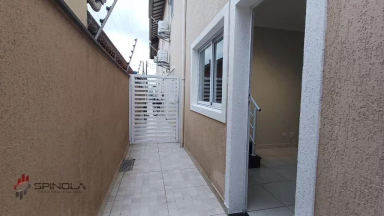 Imagem Sobrado com 2 dormitórios à venda, 58 m² por R$ 320.000,00 - Maracanã - Praia Grande/SP