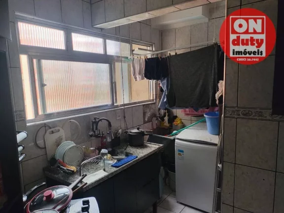 Imagem Apartamento com 2 dormitórios à venda, 64 m² por R$ 220.000,00 - Saboó - Santos/SP