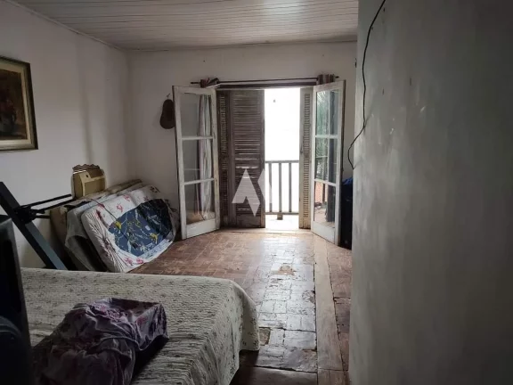 Imagem Casa Padrão à venda com 6 dormitórios pé na areia no Parque Prainha em São Vicente/SP