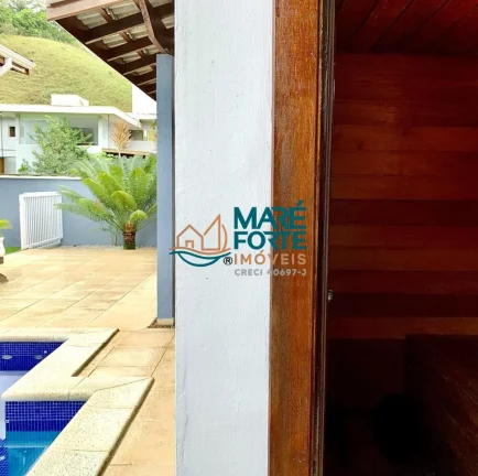 Imagem LINDA CASA COM PISCINA EM CONDOMINIO FECHADO