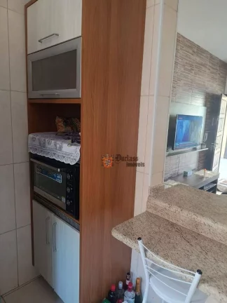 Imagem Sobrado com 2 dormitórios à venda, 79 m² por R$ 318.000 - Oceanópolis - Mongaguá/SP