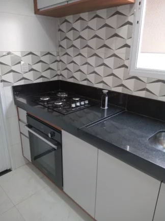 Imagem Sobrado de 2 quartos em condomínio para venda na Aviação, Praia Grande-SP: 1 banheiro, 1 vaga, 50,00 m².