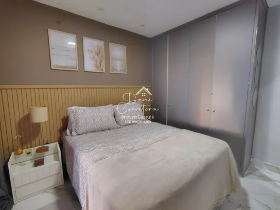 Imagem Imperdível! Apartamento de 2 quartos com suíte e 2 vagas de garagem em Pitangueiras, Guarujá-SP - 78m² de conforto e elegância!