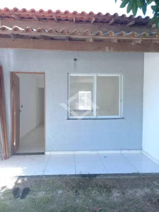 Imagem Casa na pedra de guaratiba com sala e 2 quartos, quintal e garagem