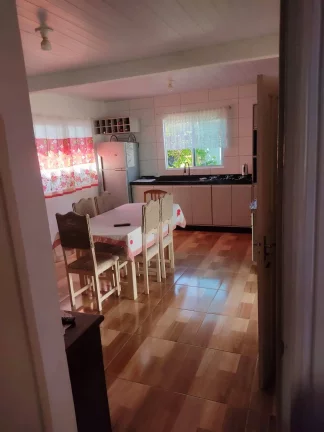 Imagem Terreno com uma casa mista no paranaguamirim