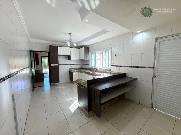 Imagem Casa com 3 dormitórios à venda, 112 m² por R$ 750.000,00 - Guilhermina - Praia Grande/SP