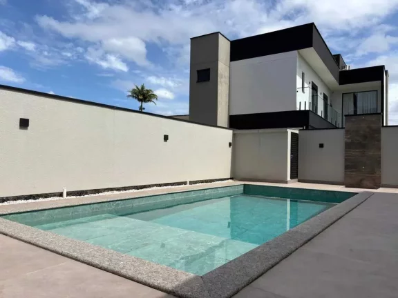 Imagem Casa em condomínio com 4 dormitórios sendo 3 suítes e 4 vagas - Camboriú/SC