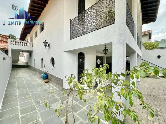 Imagem Casa 4 suítes, salão, escritório, adega, 7vagas (4 cobertas).Granja Vianna.