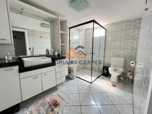 Imagem ALUGUEL ANUAL - Casa com 3 quartos sendo 1 suíte, mobiliada, sacada com churrasqueira, muito bem localizada na Praia de Gravatá em Navegantes- SC