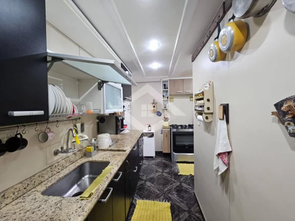 Imagem Casa à Venda na Taquara com 3 Quartos: Opção de Moradia e Negócios
