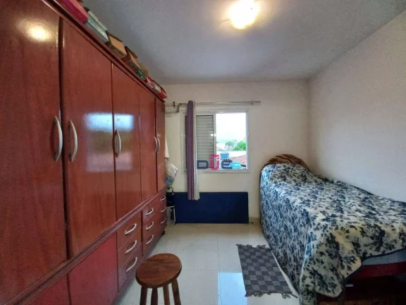 Imagem Village triplex com 2 suítes e 2 vagas à venda, 105 m² por R$ 484.000 - Macuco - Santos/SP