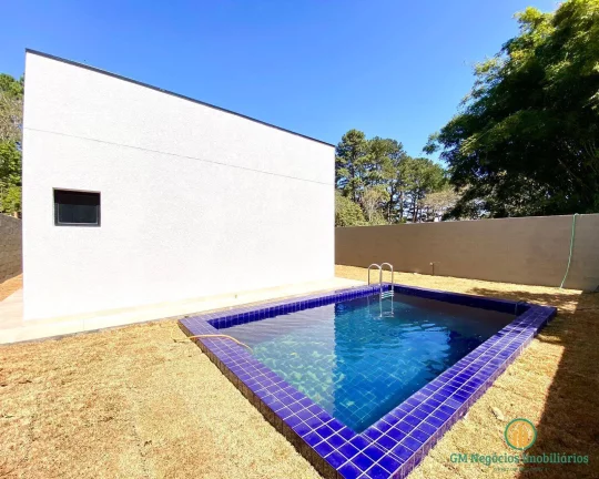 Imagem Casa nova térrea com 3 suítes quintal com piscina em condomínio