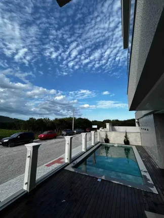 Imagem Apartamento com 2 dormitórios sendo 1 suíte e 1 vaga de garagem em Governador Celso Ramos/SC