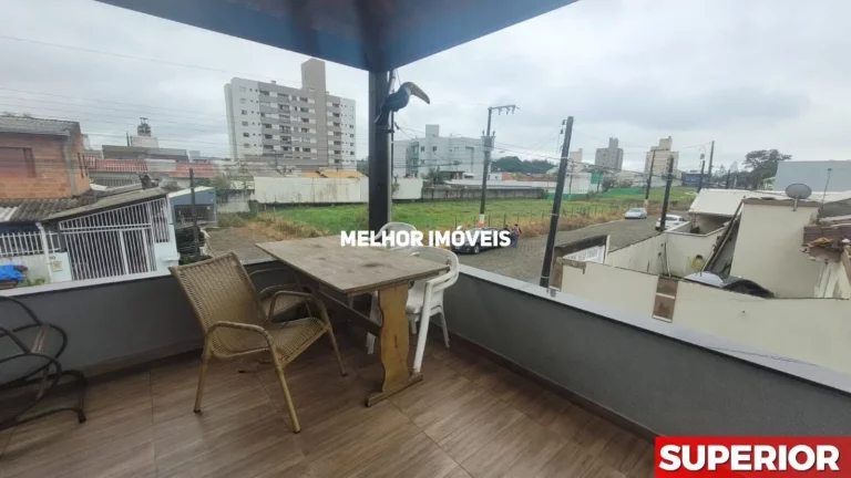 Imagem Casa de Alvenaria á venda com 6 dormitórios e 3 vagas de garagem localizada em Camboriú