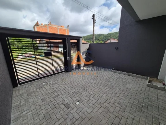 Imagem Lindo sobrado novo com 3 dormitórios sendo 1 suíte no Gravatá em Navegantes! Adriano Carpes Imóveis Vende