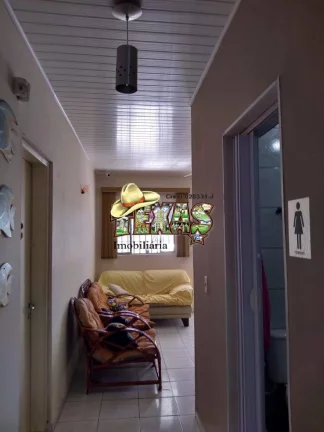 Imagem CASA À VENDA COM 3 SUÍTES ITANHAÉM