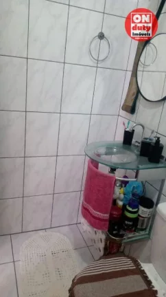 Imagem Apartamento com 2 dormitórios à venda, 64 m² por R$ 220.000,00 - Saboó - Santos/SP
