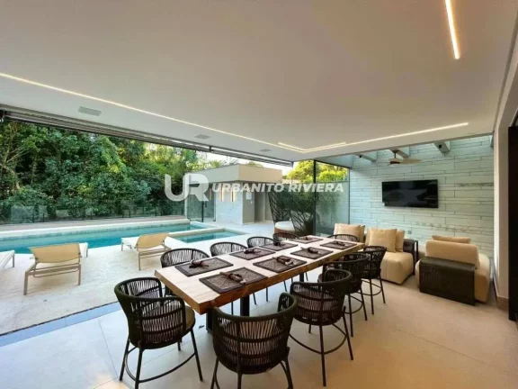 Imagem Casa de alto padrão na Riviera com design refinado e piscina com spa