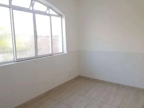 Imagem Confortável Apartamento de Três Quartos com Suíte e Garagem para Um Carro