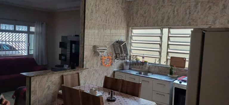 Imagem Casa com 3 dormitórios à venda, 114 m² por R$ 495.000,00 - Maracanã - Praia Grande/SP