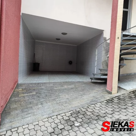 Imagem Imperdível oportunidade de adquirir sua casa na Vila Carmosina, São Paulo-SP - 2 quartos, 1 sala, 2 banheiros, 2 vagas - 89m²!