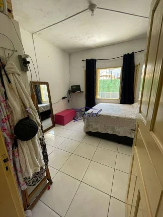 Imagem Casa com 2 dormitórios à venda, 95 m² por R$ 390.000,00 - Caiçara - Praia Grande/SP