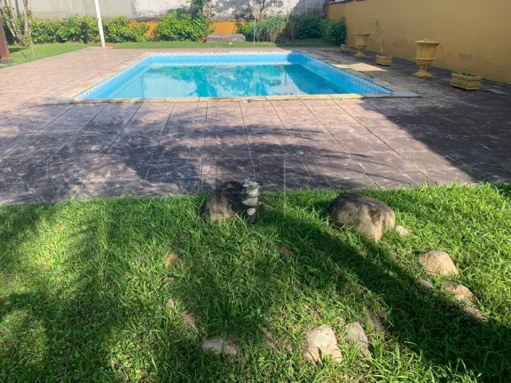 Imagem Casa em Condomínio para Venda em Ubatuba / SP no bairro Horto Florestal