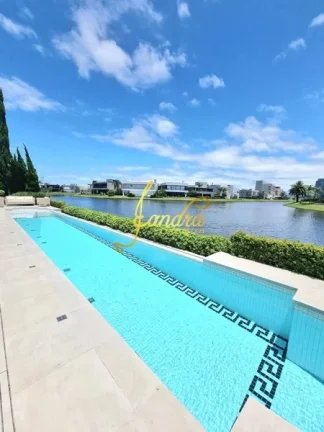 Imagem Sobrado Novo Enseada com 04 suítes, com dois lotes Beira lago