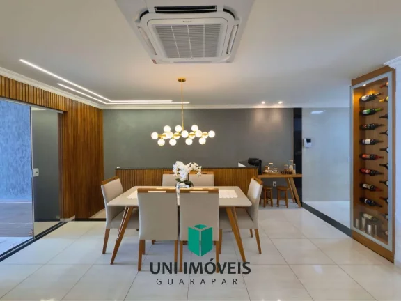 Imagem Triplex à venda em bairro nobre de Guarapari com área gourmet e deck para lagoa