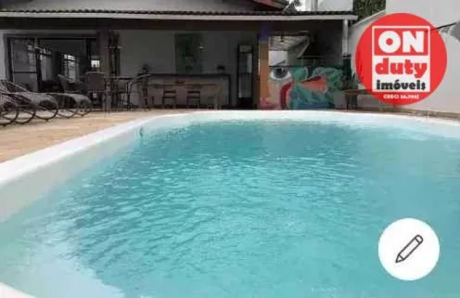 Imagem Casa com 4 suítes à venda, 200 m² por R$ 1.500.000 - Jardim Virginia - Guarujá/SP