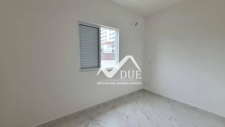 Imagem Casa Sobreposta com 3 dormitórios à venda, 115 m² por R$ 850.000 - Embaré - Santos/SP