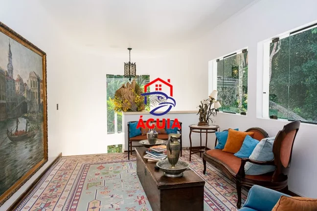Imagem Belíssima casa em condomínio fechado em meio a Mata Atlântica com vista para o mar!!