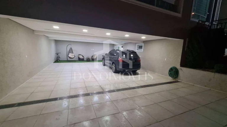 Imagem Sobrado de alto padrão em condomínio fechado - 585m² | 6 suítes