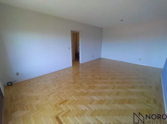 Imagem Apartamento Espaçoso e Ensolarado com 3 Dormitórios (1 suite) e Garagem no Bairr