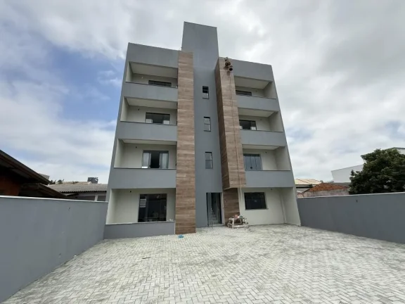 Imagem Apartamento de dois dormitórios, sendo uma suíte, sacada com churrasqueira e uma vaga de garagem no bairro de Gravatá, em Navegantes - Adriano Carpes imóveis vende