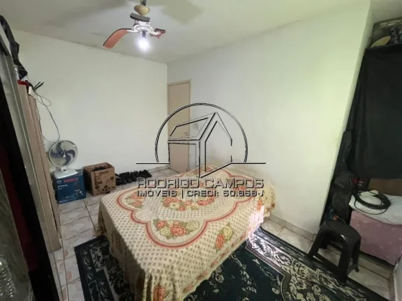 Imagem Sobrado Aconchegante à Venda em Nova Mirim, Praia Grande - 2 Quartos
