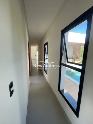 Imagem Alto Padrão: casa linear com 3 suítes à venda no Condomínio Riviera Park - Vila Velha